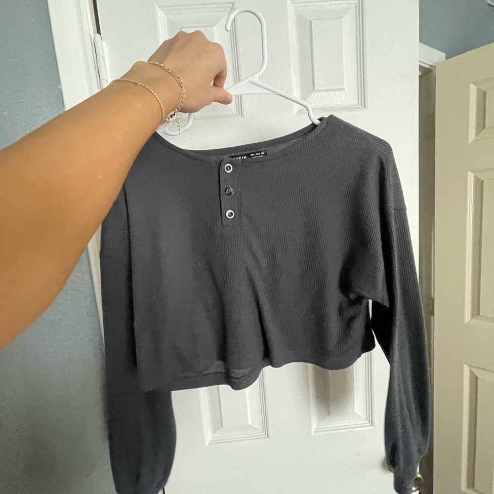 Two cropped long sleeves